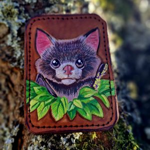 Porte carte chauve souris en cuir